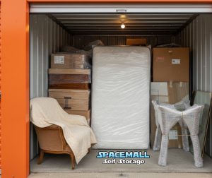 A nicely packed storage unit framed in orange.
